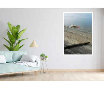 The boat and its red buoy