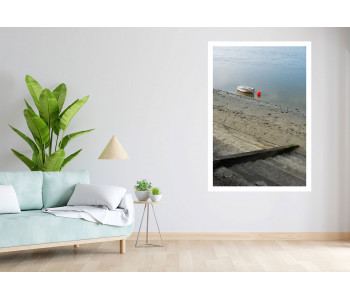 The boat and its red buoy